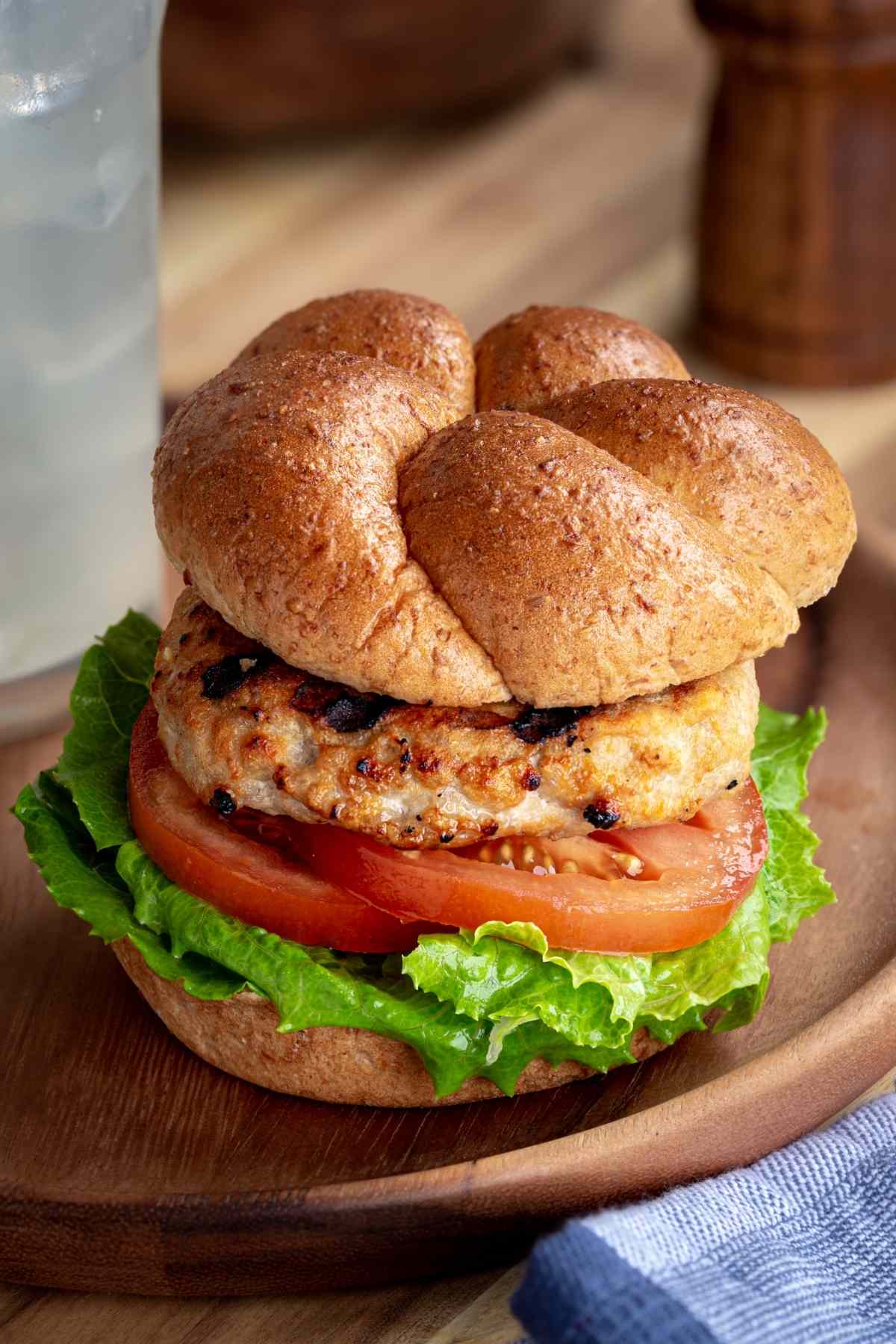 When perfectly cooked, they’re tender, juicy, and delicious. In this post, we’re sharing some tips and guidelines on the proper turkey burger temperature and how to cook them so that they are juicy and delicious every time.