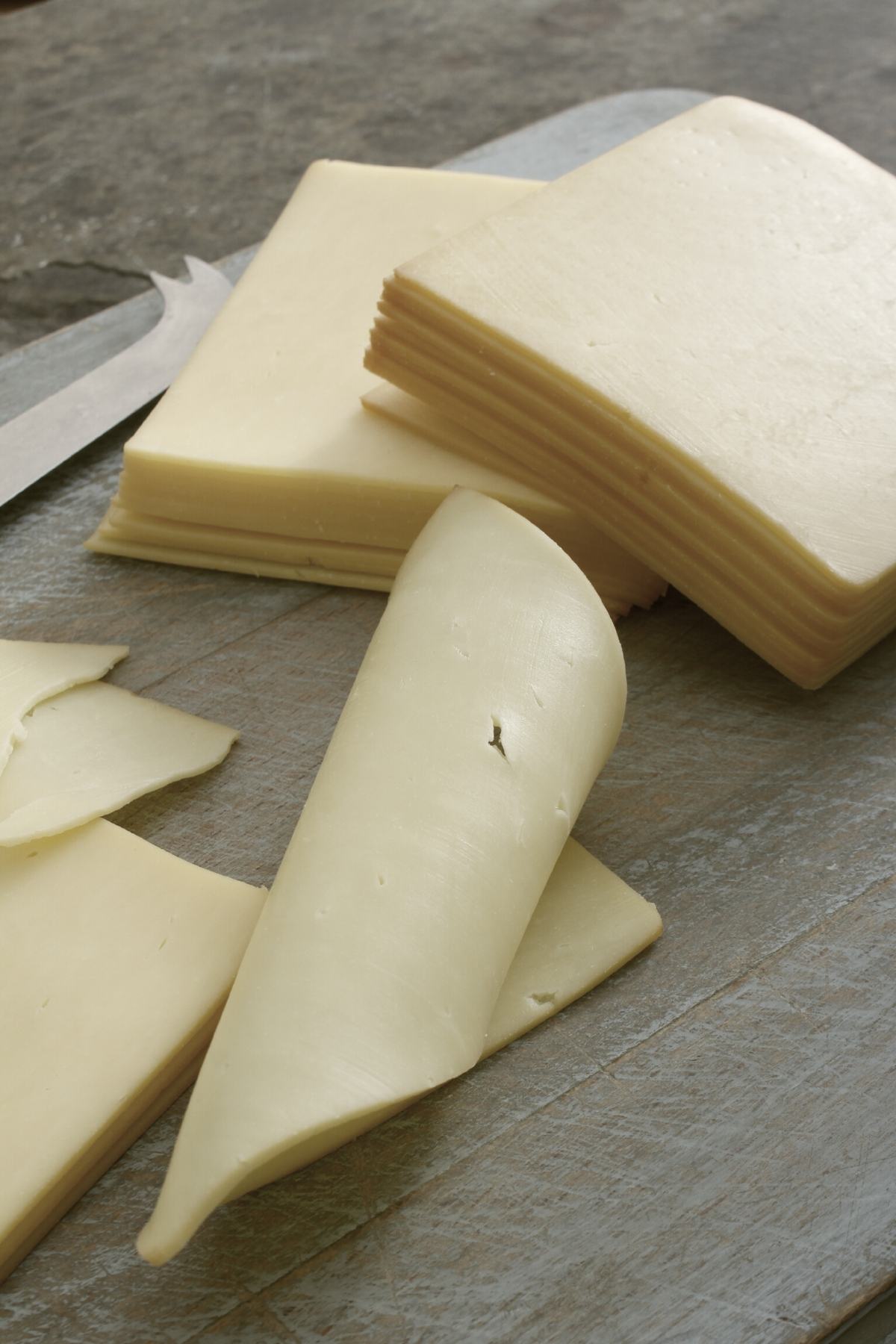 If you love to eat cheese you’ve probably tasted both white and yellow American cheese. Both are delicious and can be enjoyed on their own, in sandwiches, on charcuterie boards and in cooked dishes.
