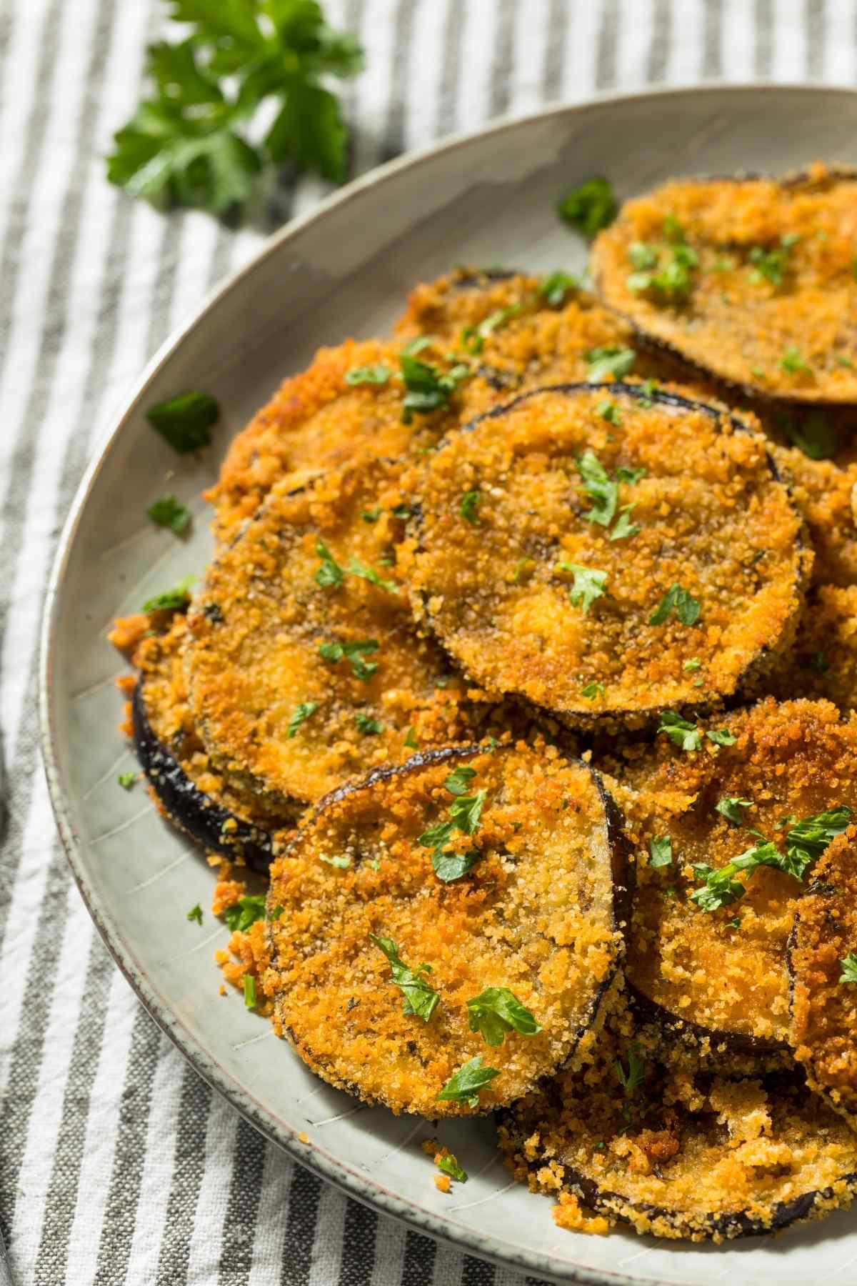 This tasty fried eggplant takes less than 30 minutes to make and is deliciously crisp. If you’re looking for a new side dish, give this recipe a try!