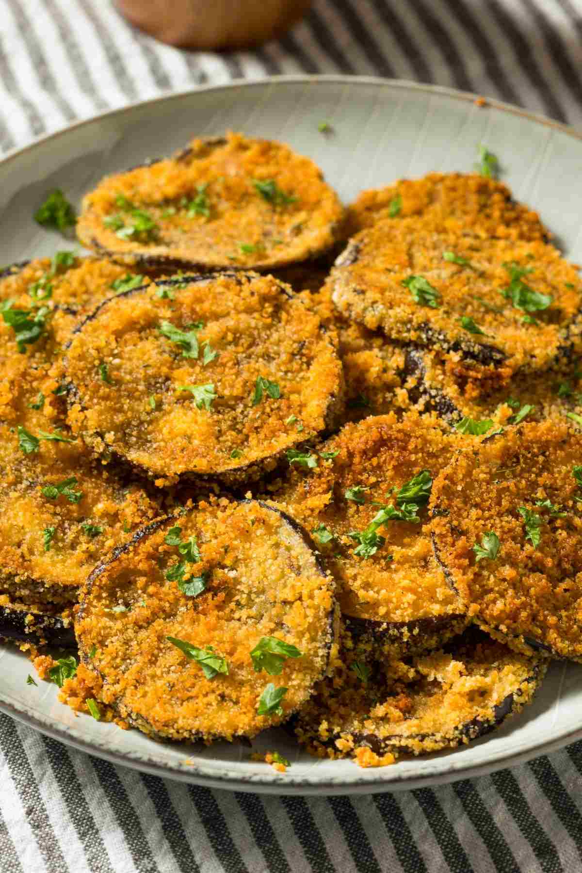 This tasty fried eggplant takes less than 30 minutes to make and is deliciously crisp. If you’re looking for a new side dish, give this recipe a try!