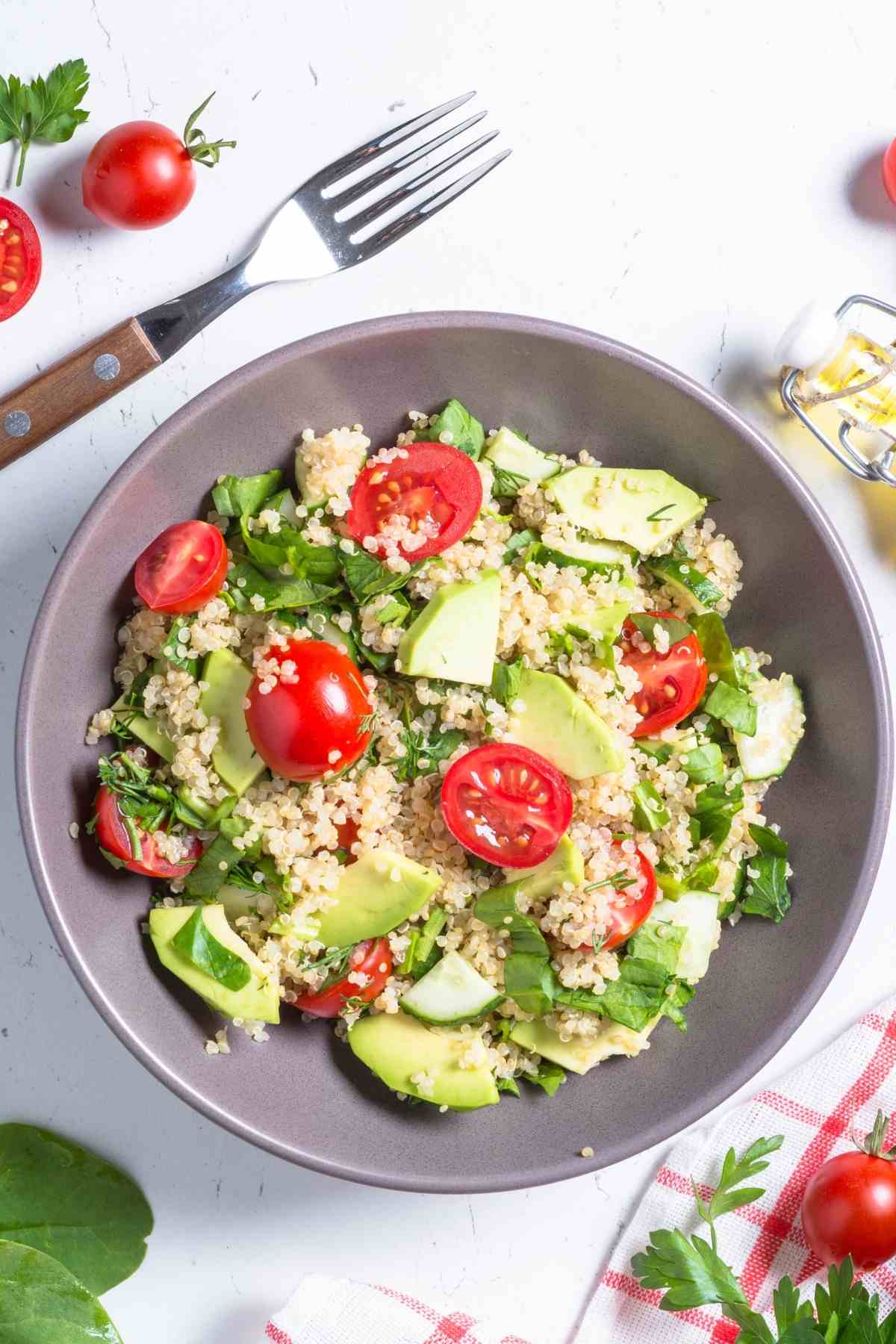 Refreshing, crisp, and delicious, this guacamole quinoa salad is a must-try! Not only is it vegan and dairy-free, but it's also gluten- and nut-free, making it the ideal salad to take along to your next potluck!