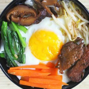 Sheet pan cooking is an easy and efficient way to get dinner on the table. This Sheet Pan Bibimbap has all of the flavors you love and is ideal for busy weeknights.