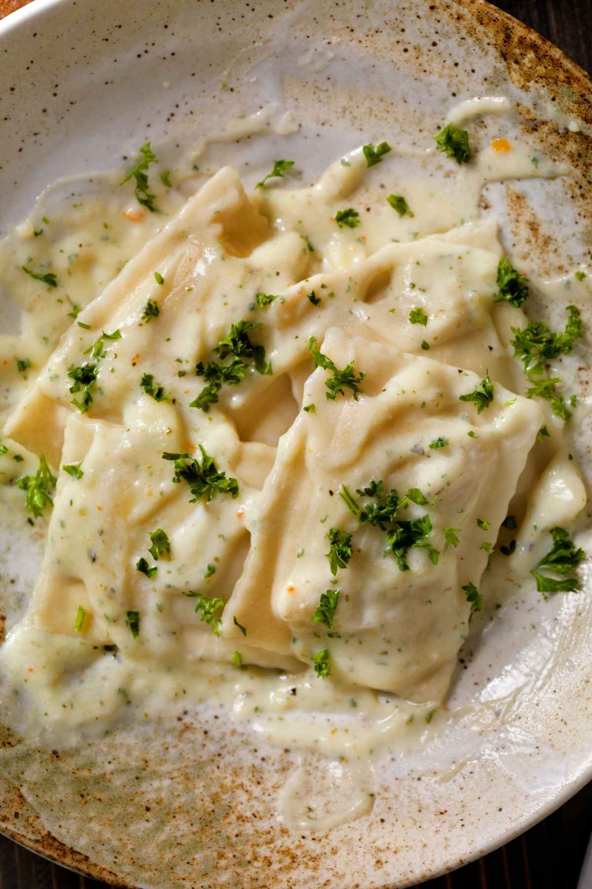 Alfredo sauce is delicious served with pasta. It’s easy to make at home, and this recipe uses whole milk instead of cream.