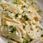 Alfredo sauce is delicious served with pasta. It’s easy to make at home, and this recipe uses whole milk instead of cream.