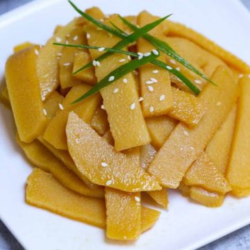 If you’ve ordered a stir-fry at your favorite Asian restaurant, it may have included bamboo shoots as an ingredient. This recipe for bamboo shoots is incredibly easy to make and is ideal as a side dish.
