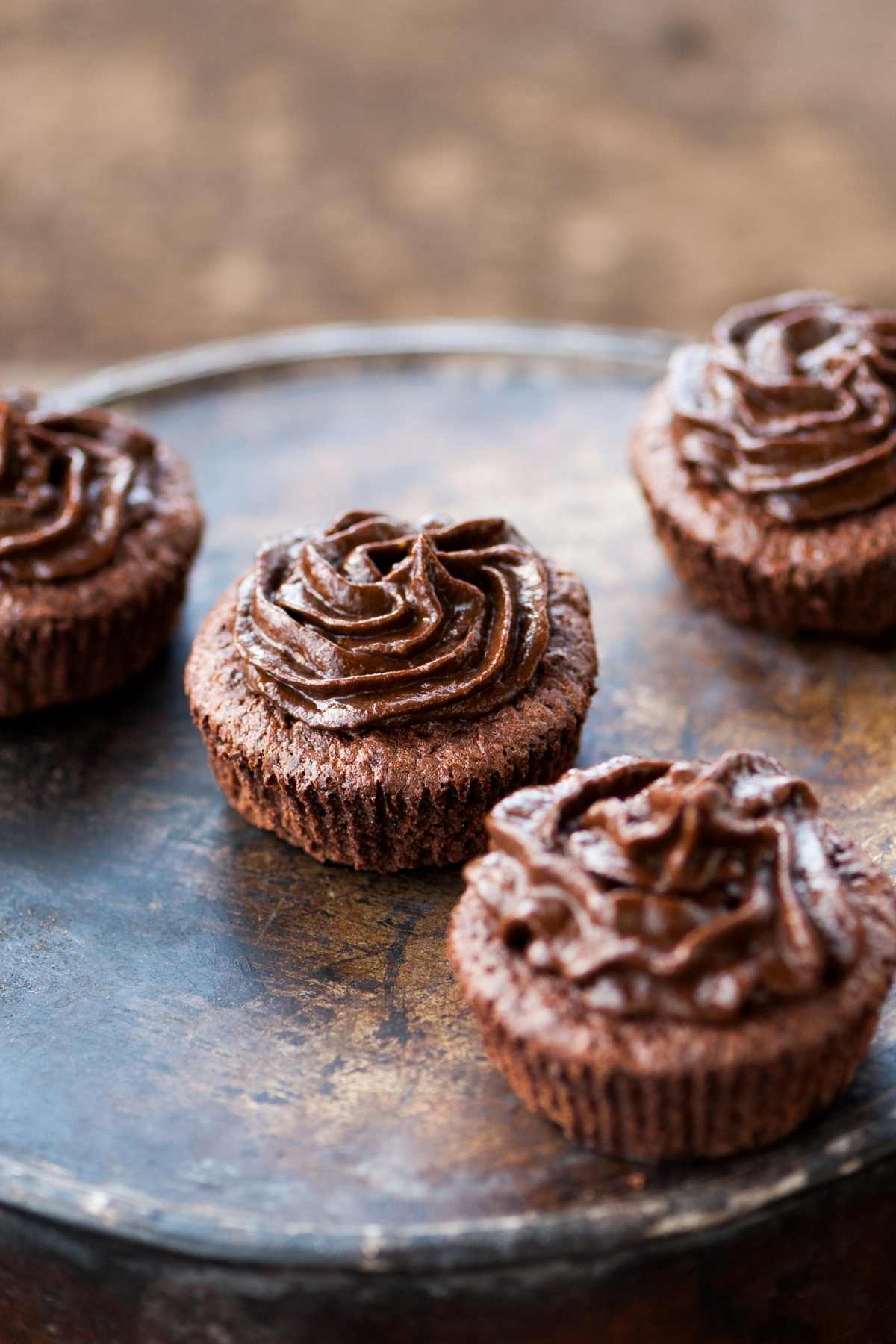 If you’ve run out of powdered sugar and need to make chocolate frosting, this recipe is the answer. It’s made with regular granulated sugar and comes out perfectly light and smooth.
