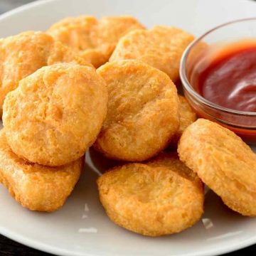 McDonald’s chicken nuggets are a longtime family favorite. Now you can make them at home in no time flat. This recipe uses ground chicken for a better-than-the-original quality. Crunchy outside, tender inside.