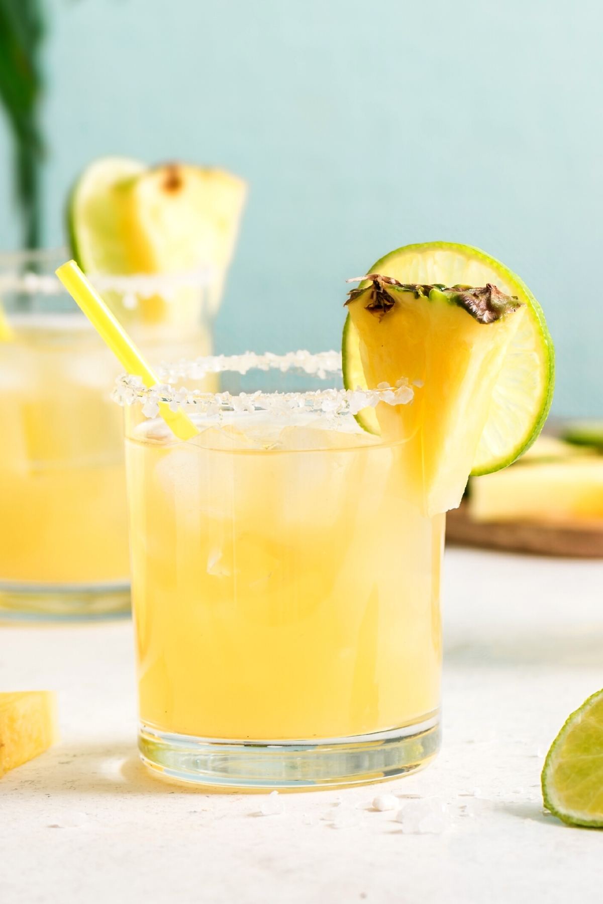Looking for a low-cost alternative to a tropical destination vacation? This Pineapple Vodka Cocktail is just the thing to mimic the feeling you get in the tropics. The best part? It only takes three ingredients to make!