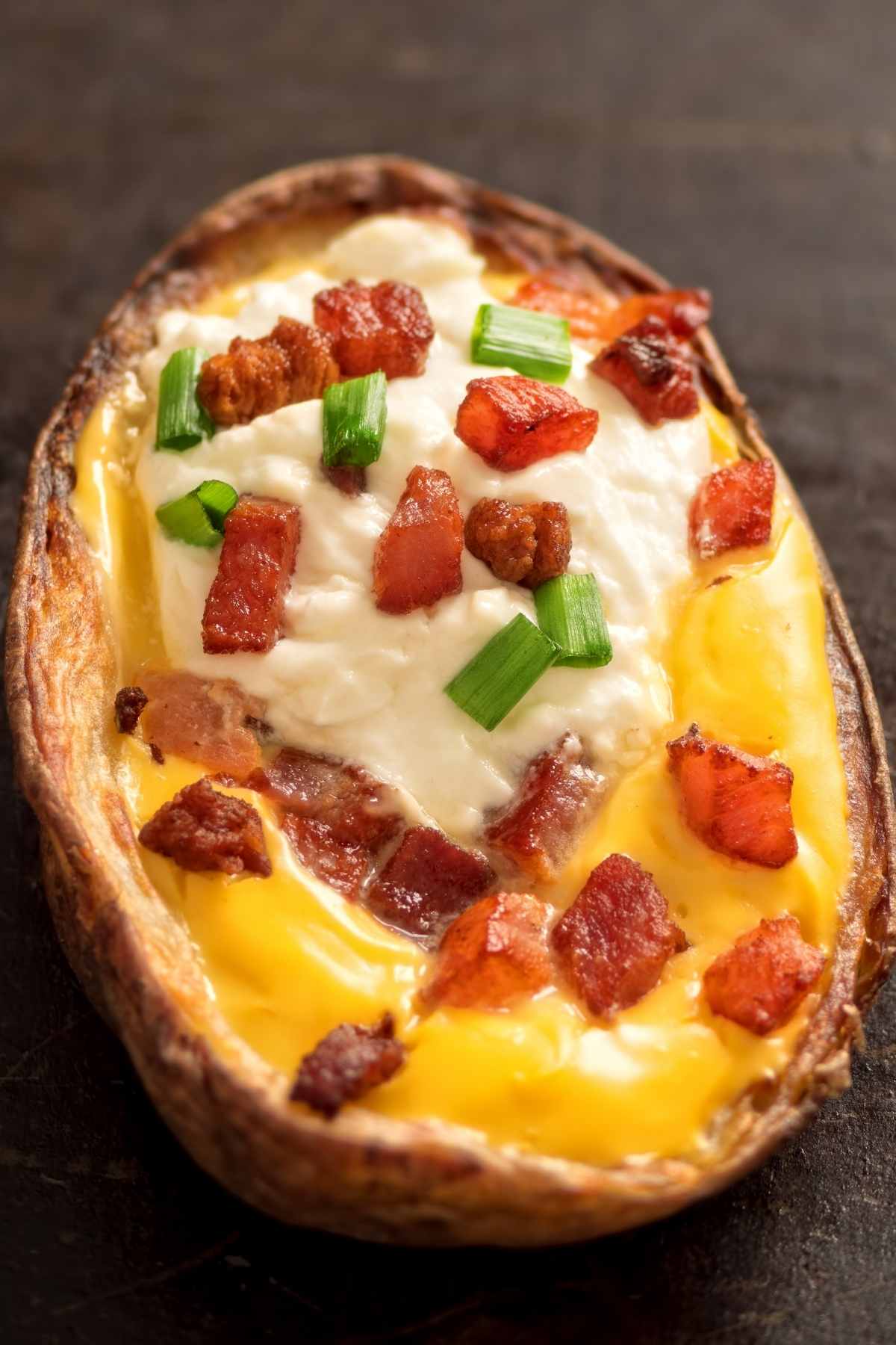 If you love the potato skins served at TGI Fridays, you’ll want to try this copycat recipe. It’s the perfect dish to serve to a crowd when you’re hosting game day or movie night.