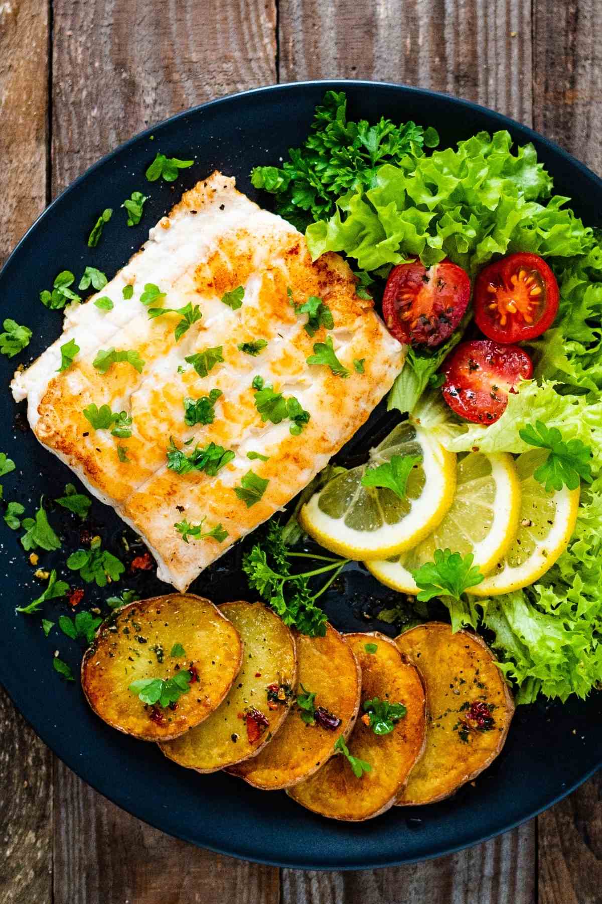 This Broiled Cod is delicately seasoned with butter, garlic, lemon juice, lemon zest, and fresh parsley. It comes together in just 20 minutes, making it ideal for busy weeknights.