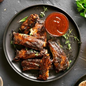 Enjoy these Oven-Baked Beef Back Ribs any time of the year. They bake low and slow in the oven and are perfectly seasoned with garlic powder, onion powder, smoked paprika, smoked salt, and hot pepper sauce for a bit of heat!