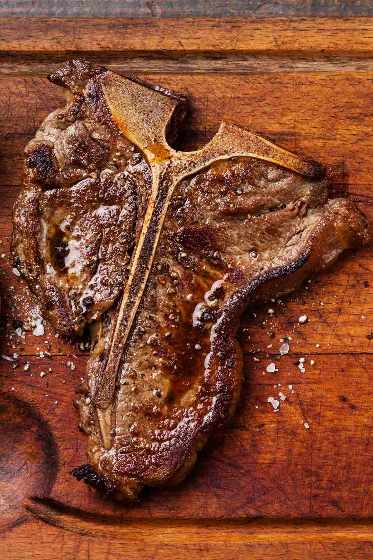 Serve this tender and flavorful Oven-Baked T-Bone Steak at your next celebration dinner! It’s seasoned with butter, olive oil, garlic, fresh rosemary, salt, and pepper and bakes beautifully.