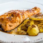 You might be surprised to discover the delicious flavor of this Peanut Butter Glazed Salmon. The salmon is perfectly cooked, and the glaze is a tasty combination of peanut butter, chili garlic sauce, and orange juice.