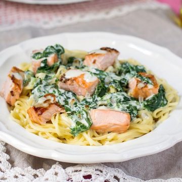 This Creamy Salmon Pasta is a delicious one-dish meal that’s easy enough to serve during the week. It features an irresistible sauce that’s made with heavy cream, white wine, butter, garlic, and lemon zest.