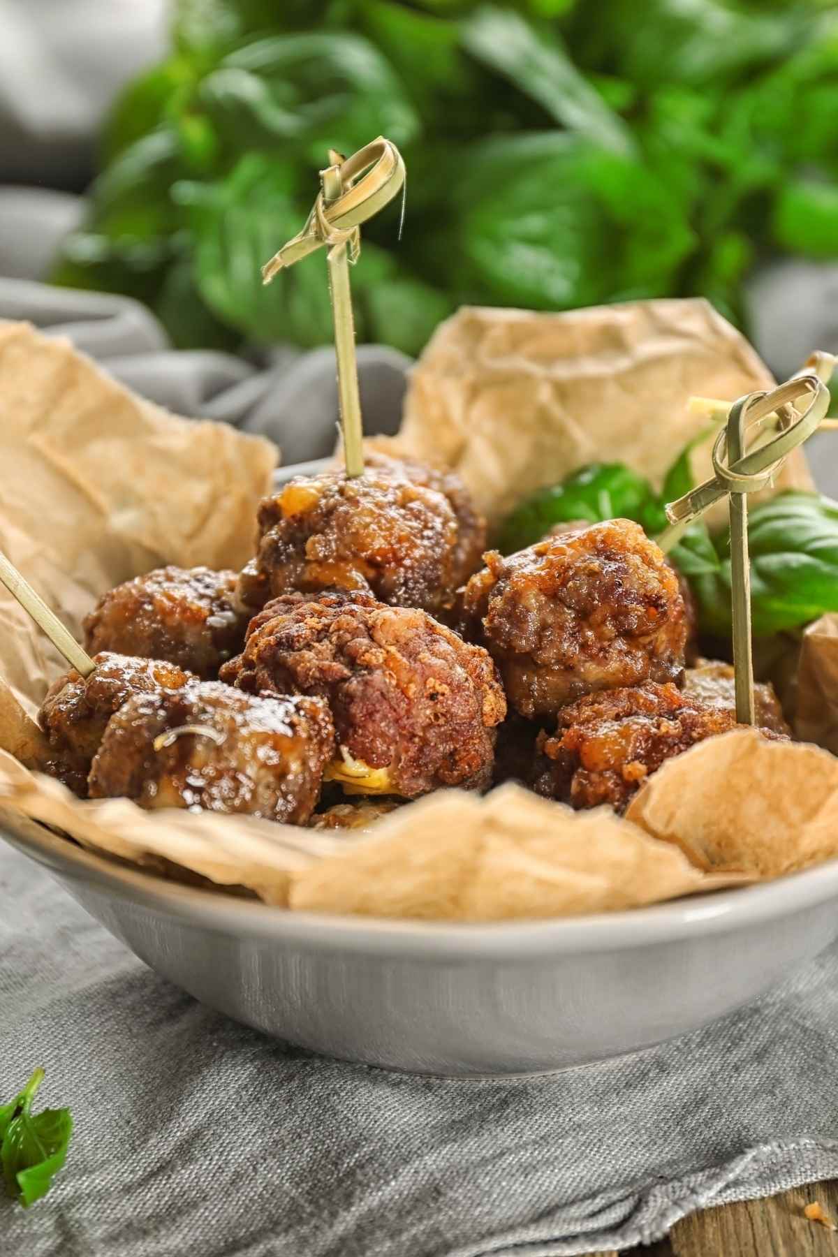 These savory Sausage Balls come together with just 5 ingredients. They have a delicious cheesy flavor that pairs well with the pork sausage.
