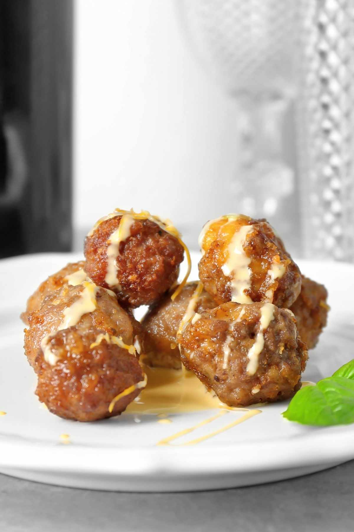 These savory Sausage Balls come together with just 5 ingredients. They have a delicious cheesy flavor that pairs well with the pork sausage.