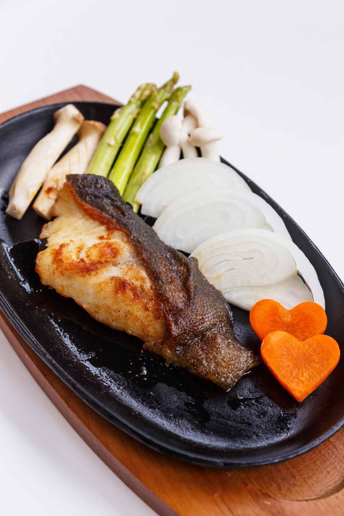 Black cod, also known as sablefish, is prized for its soft texture and buttery flavor. This recipe for Oven Baked Black Cod is easy to prepare and features the delicious flavors of soy sauce, cooking wine, and sugar for a hint of sweetness.