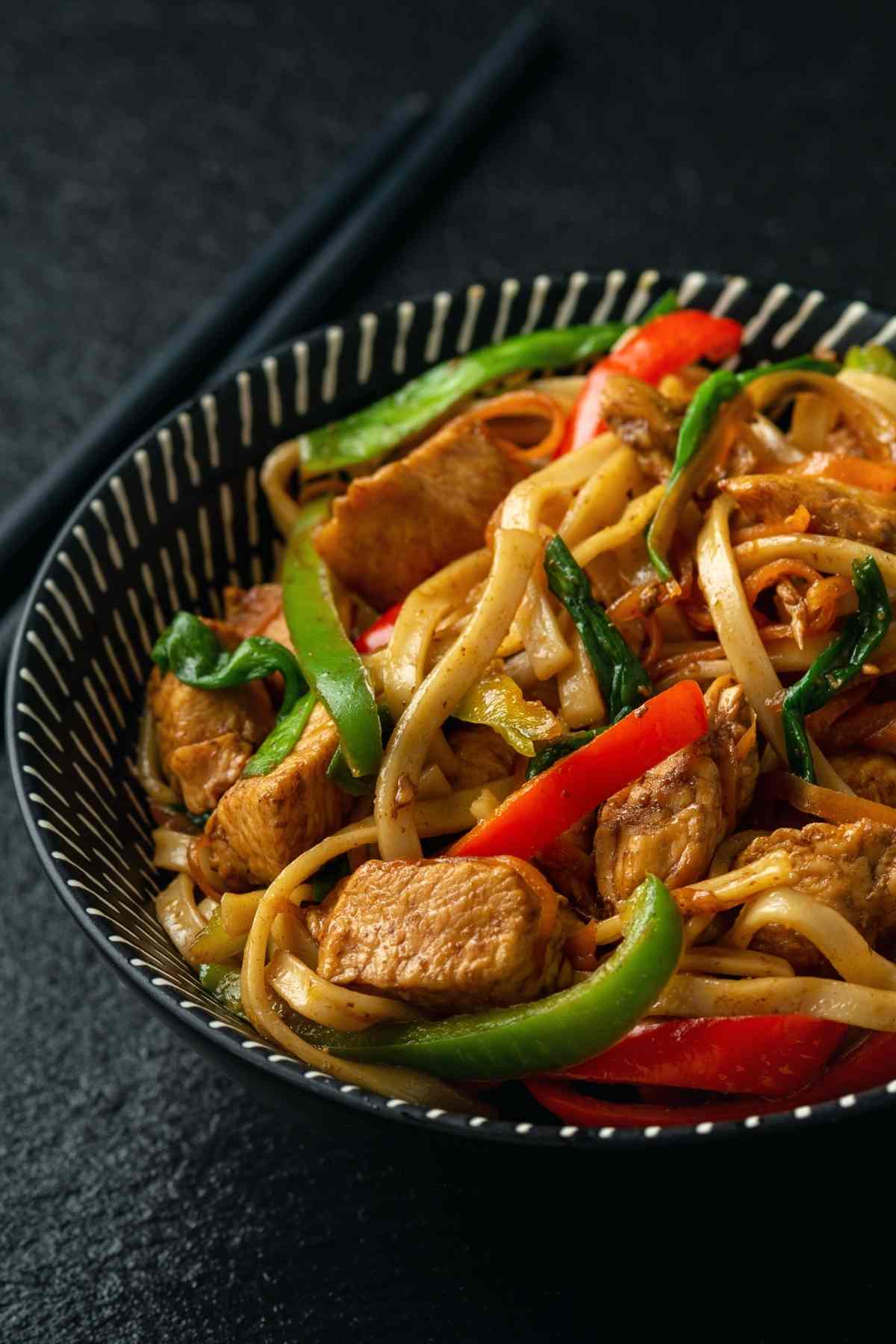 Chicken Chow Fun is loaded with wide noodles, tender chicken pieces, and crispy vegetables, and it's ready in minutes! Prepare to be amazed at what you can create with just a few ingredients and a nonstick skillet!