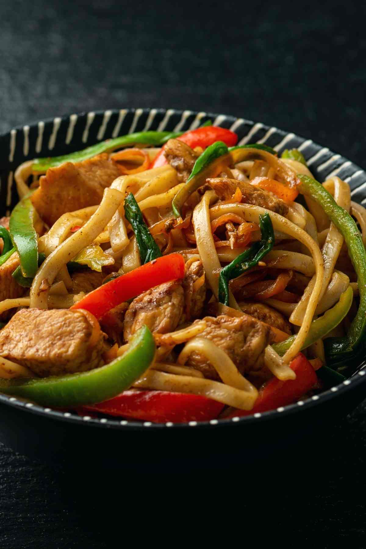 Chicken Chow Fun is loaded with wide noodles, tender chicken pieces, and crispy vegetables, and it's ready in minutes! Prepare to be amazed at what you can create with just a few ingredients and a nonstick skillet!