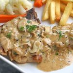 These Cream of Mushroom Pork Chops are the perfect solution for easy weeknight dinners. The pork chops are seared until golden brown and topped with a creamy mushroom sauce.