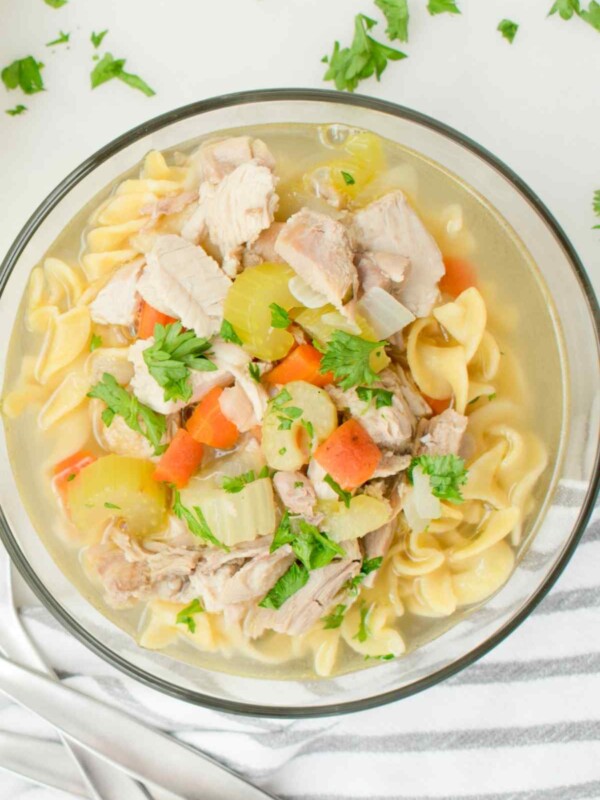 Save the turkey carcass from your Thanksgiving dinner and transform it into a delicious soup! This Leftover Turkey soup is perfectly seasoned and full of flavor. It features veggies, noodles, and a savory broth.