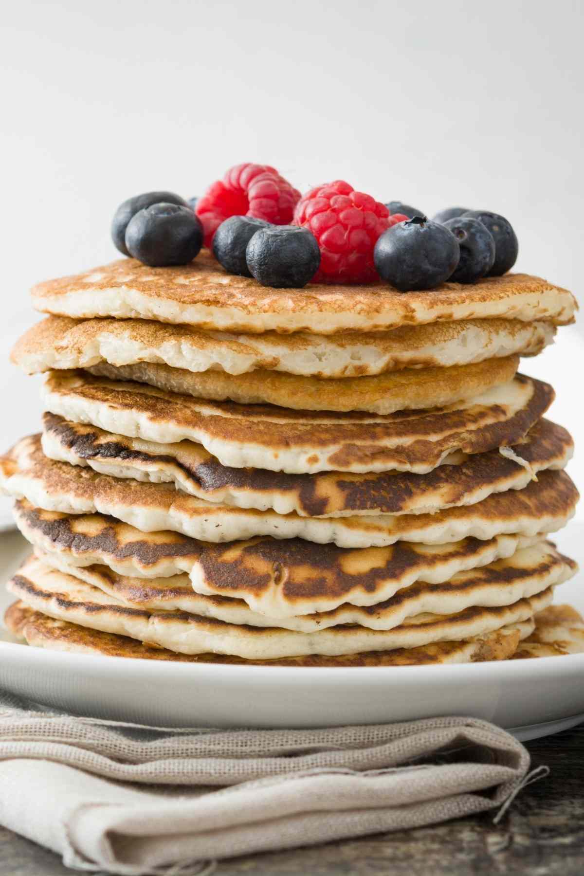 These Oatmeal Pancakes are light, fluffy, and have a touch of texture from the oats. They’re flavored with maple syrup, vanilla, and cinnamon and have a slightly tangy flavor.