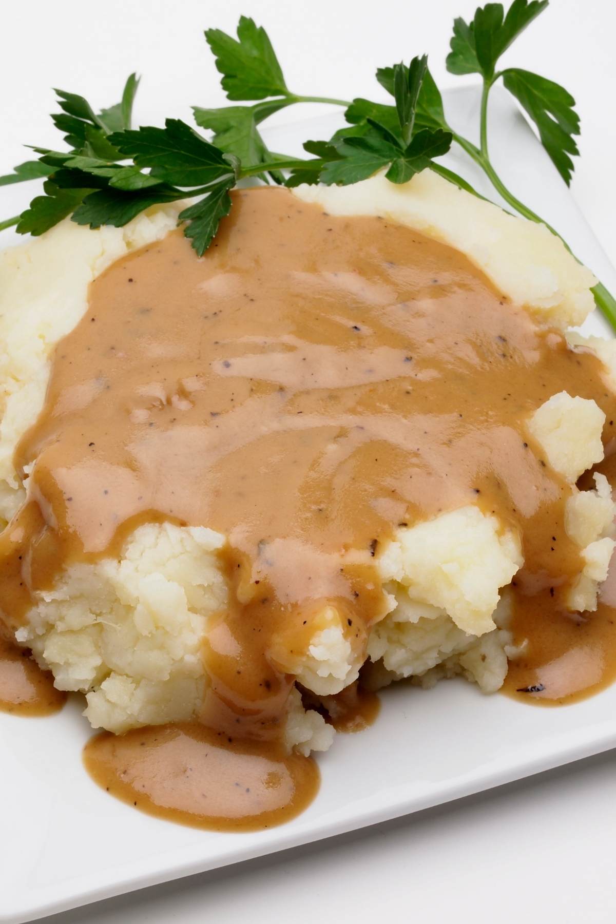 Use the drippings from roast pork to make this delicious Pork Gravy! It’s super easy, and you’ll love the rich and savory flavors.