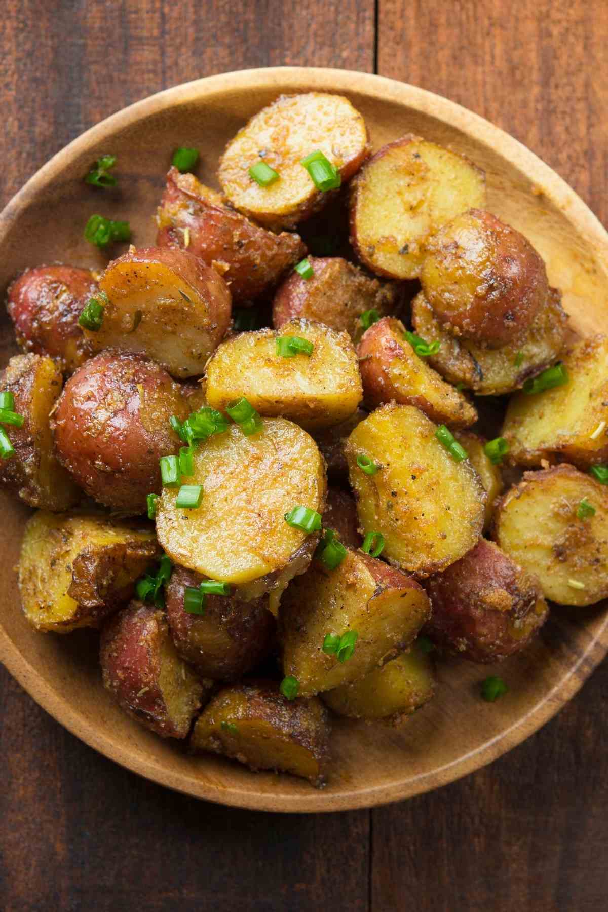 These roasted red potatoes are tender on the inside, crispy on the outside, and coated in a delicious combination of garlic, herbs and Parmesan cheese. They’re the perfect dish to serve alongside chicken, beef, pork, or fish.