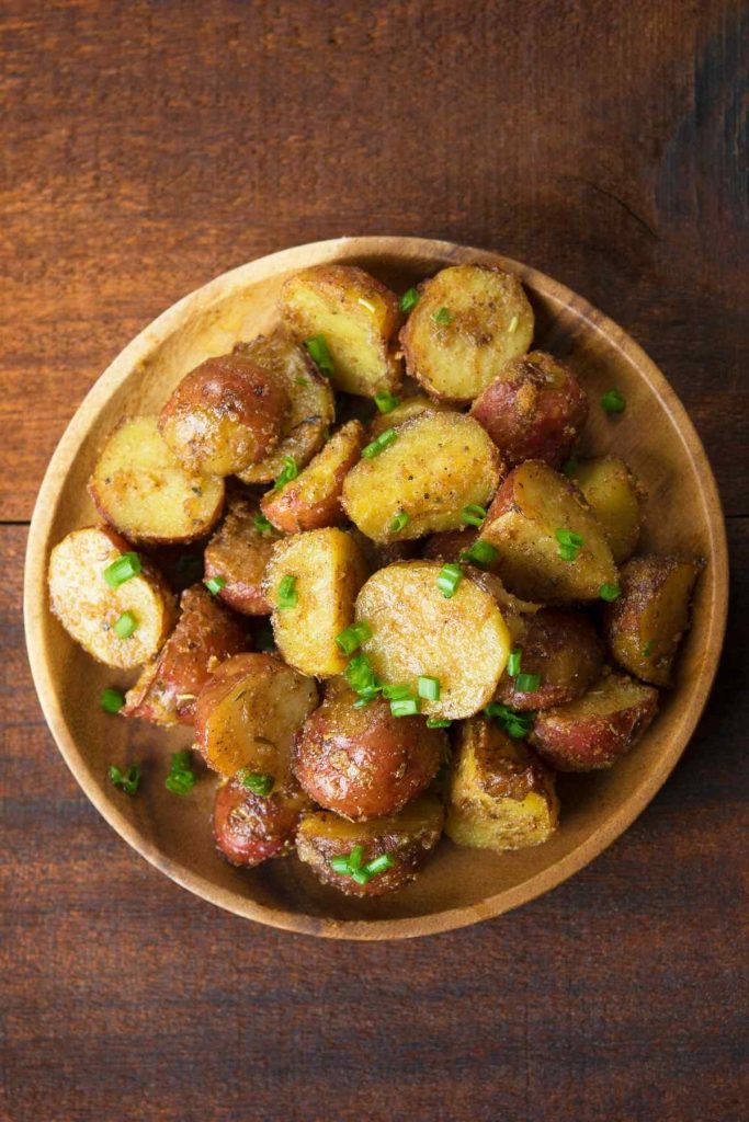 These roasted red potatoes are tender on the inside, crispy on the outside, and coated in a delicious combination of garlic, herbs and Parmesan cheese. They’re the perfect dish to serve alongside chicken, beef, pork, or fish.