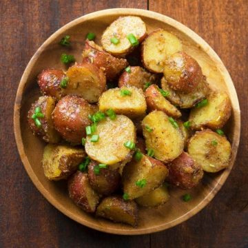 These roasted red potatoes are tender on the inside, crispy on the outside, and coated in a delicious combination of garlic, herbs and Parmesan cheese. They’re the perfect dish to serve alongside chicken, beef, pork, or fish.
