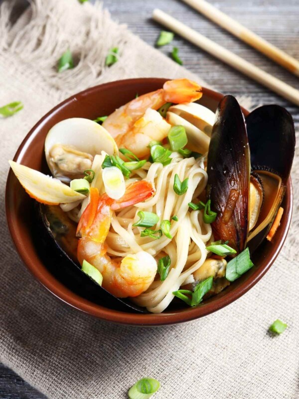 This delicious Seafood Udon is topped with tender shrimp, scallops, salmon, and clams. It’s full of savory flavor and takes just 30 minutes to make.