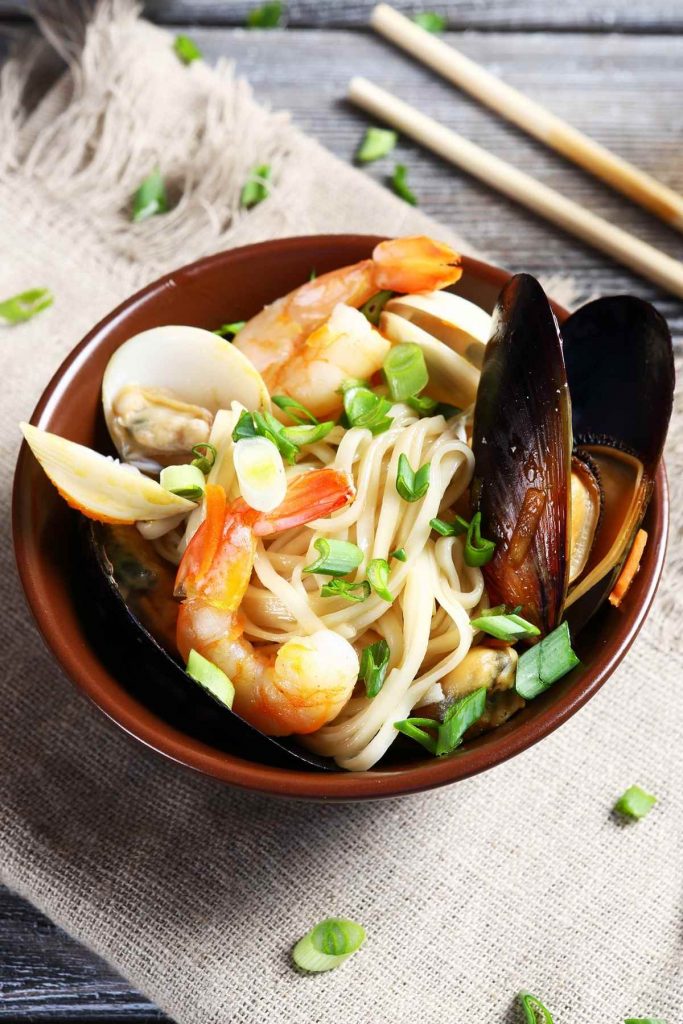 This delicious Seafood Udon is topped with tender shrimp, scallops, salmon, and clams. It’s full of savory flavor and takes just 30 minutes to make.