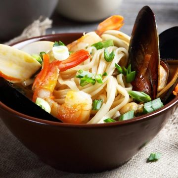 This delicious Seafood Udon is topped with tender shrimp, scallops, salmon, and clams. It’s full of savory flavor and takes just 30 minutes to make.