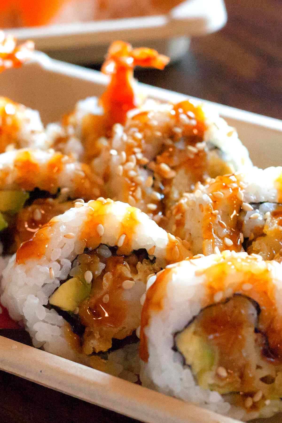 Get ready for an explosion of flavors with this easy-to-make sushi roll! A Dynamite Roll features crispy tempura shrimp, avocado, cucumber, mango and a delicious sauce that simply tantalizes your taste buds. A beautiful combination of sweet and savory flavors, we highly recommend serving this roll as a dinner party appetizer. However, we also understand if you decide to keep this delicious secret to yourself.