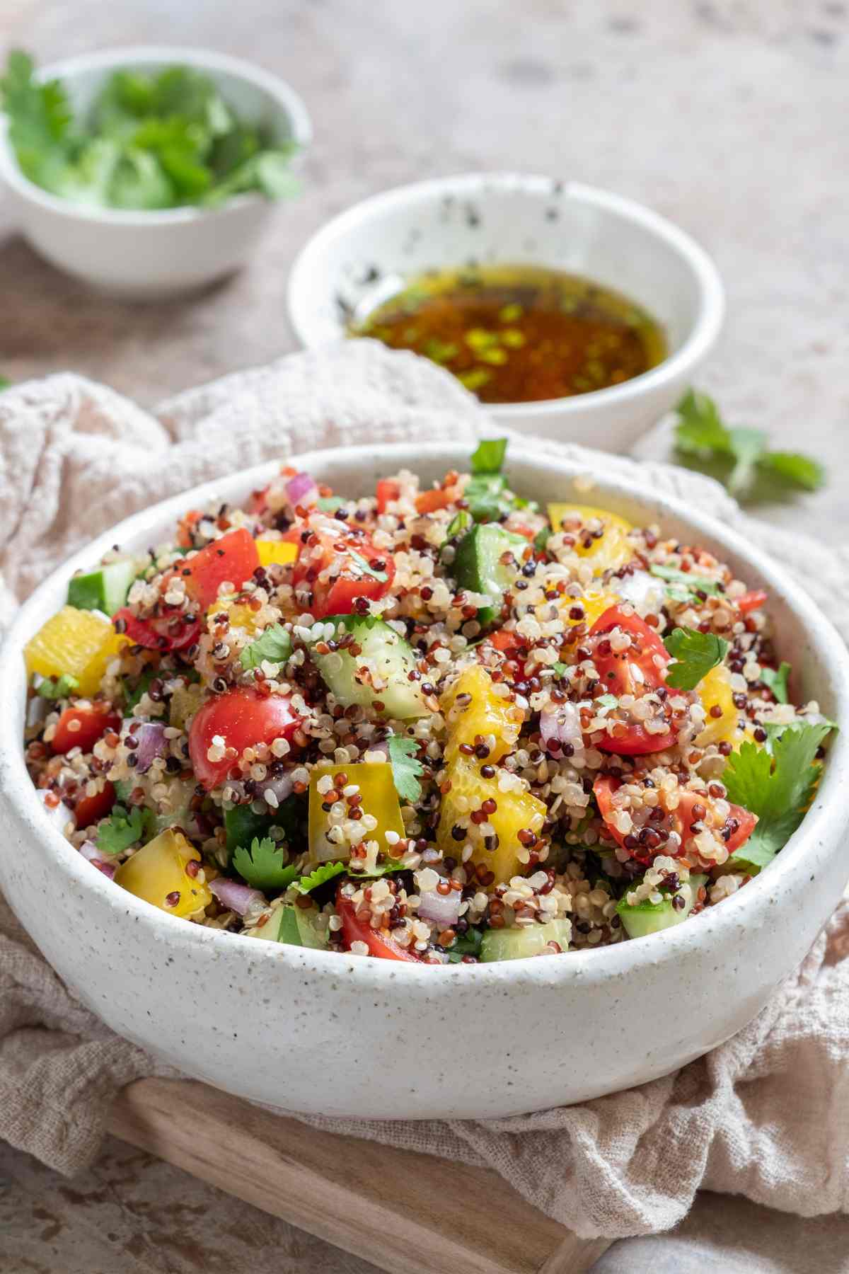 Tabbouleh is a traditional Middle Eastern salad that makes a delicious vegetarian entree or a healthy side dish. It’s a delicious combination of protein-packed quinoa, flavorful herbs and fresh vegetables. The result is a light and refreshing summer salad that keeps you full for hours past lunchtime.