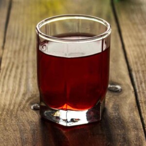 If you’re looking to add a tasty new drink to your home bar, try this red-headed slut shot! It’s a delicious combination of peach schnapps, Jagermeister, and cranberry juice.