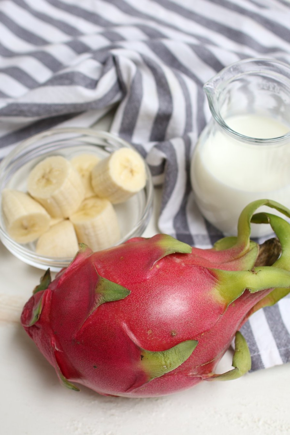 Dragonfruit smoothie ingredients gathered on the counter