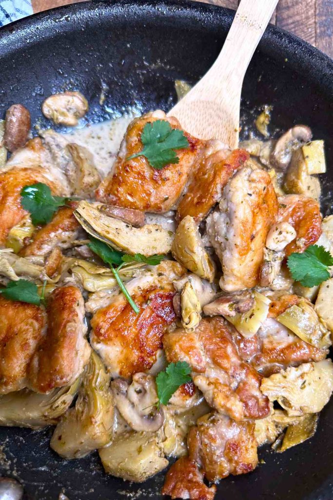 Chicken Jerusalem is a mouthwatering dish of golden pan-fried chicken with mushrooms and artichokes in a rich, creamy wine sauce. It's a flavorful and comforting meal that’s perfect for a quick weeknight dinner.