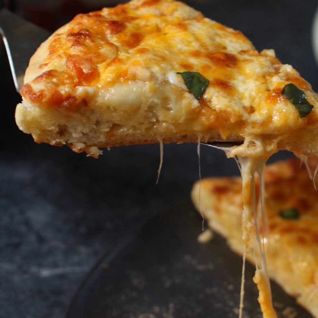 Baked cheese pizza with this pizza dough
