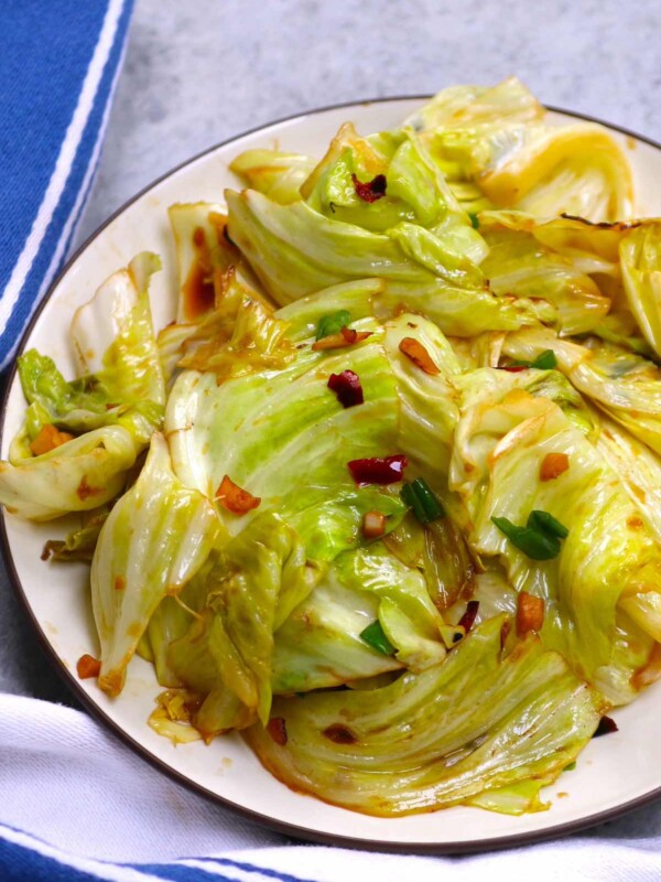 My favorite way to cook Chinese cabbage! This stir fry has a balanced savory, tangy, and sweet flavor with a kick of heat. The cabbage is nicely caramelized with a tender but still crunchy texture. and so easy to make! Enjoy it as a side dish, or add it to soups or noodles for a complete meal. Ready in 10 minutes, serve over fluffy rice or noodles!