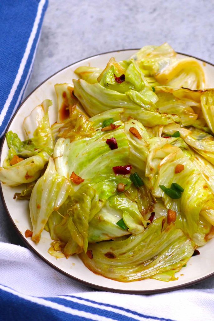 My favorite way to cook Chinese cabbage! This easy stir fry has a balanced savory, tangy, and sweet flavor with a kick of heat. The cabbage is nicely caramelized with a tender but still crunchy texture. Ready in 10 minutes, serve as a side dish to fluffy rice, noodles, or soups!