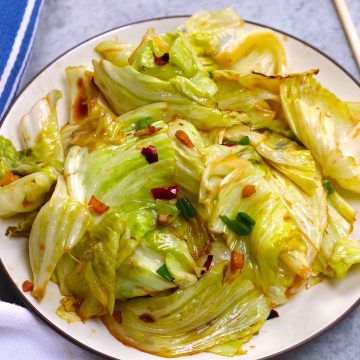 This Chinese cabbage stir fry is a quick, easy, and flavorful side dish. Make sure to get all the ingredients ready before starting cooking. It only takes about 5 minutes to cook! Serve it with pork, chicken, and steamed rice.
