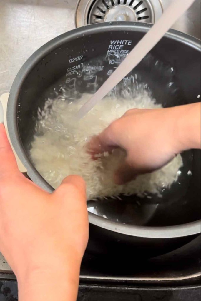 Rinse the rice under cold running water