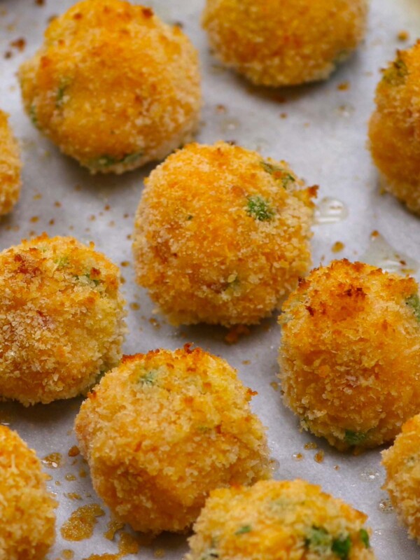 You can BAKE Arancini in the oven! These Italian rice balls are perfectly crisp on the outside, cheesy and creamy in the middle. Serve them with marinara or tomato-based sauce – great for special occasions and festive gatherings.