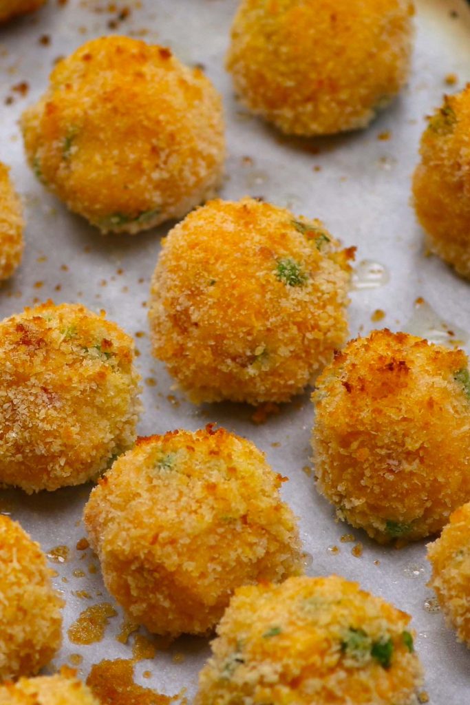 You can BAKE Arancini in the oven! These Italian rice balls are perfectly crisp on the outside, cheesy and creamy in the middle. Serve them with marinara or tomato-based sauce – great for special occasions and festive gatherings.