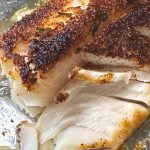 Freshly broiled cod showing the flaky and tender texture