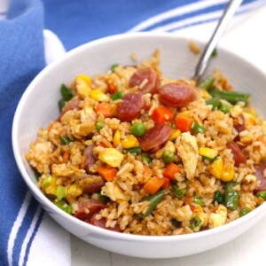 Learn how to make the delicious sweet and savory Chinese sausage fried rice with this easy recipe. It takes less than 15 minutes to make, and is easy to customize with your favorite add-ins!