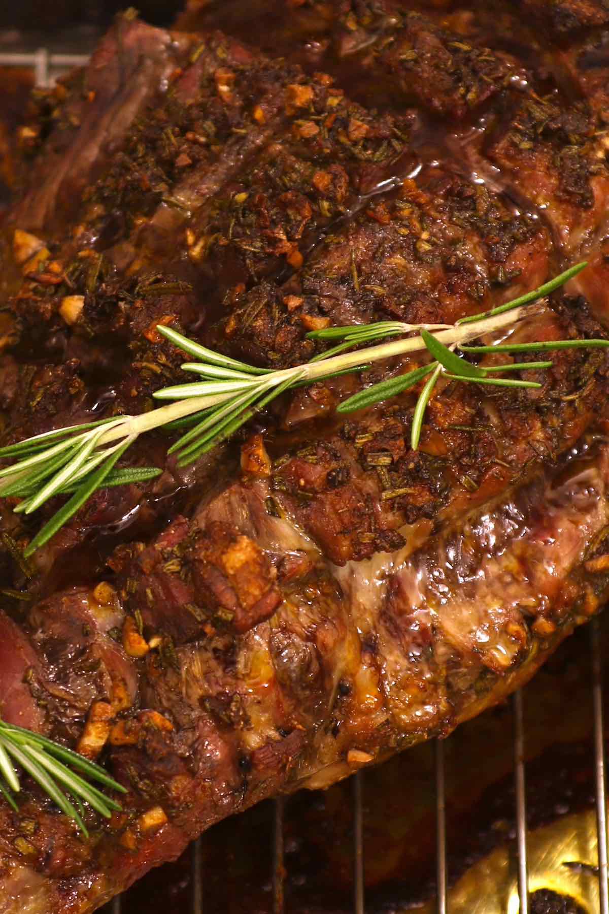 This juicy and EASY Roasted Leg of Lamb recipe features an herb and garlic seasoning on a bone-in or boneless leg of lamb. This no-fail method will give you the perfect and delicious result every time – perfect for special occasions or holiday dinners.